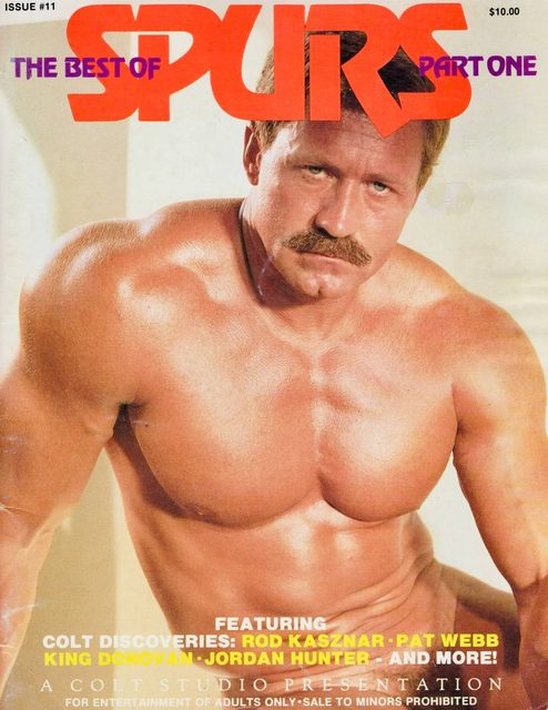 A vintage Spurs magazine cover featuring a muscular, moustachioed man posing shirtless in a classic Colt Studio presentation.