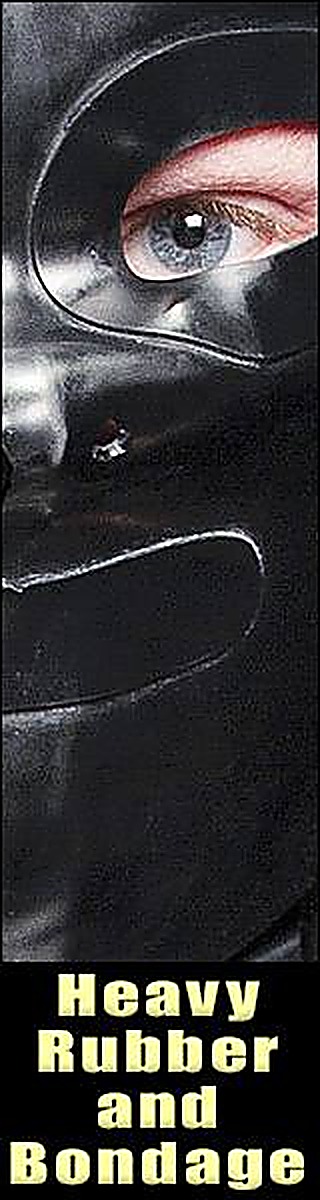 A close-up view of a person wearing a heavy black rubber hood with eye cutouts revealing a blue eye.